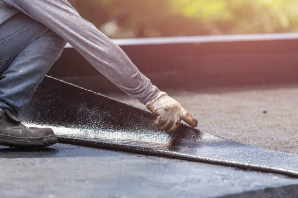 Professional Exterior Waterproofing technician working in Williamsburg, VA